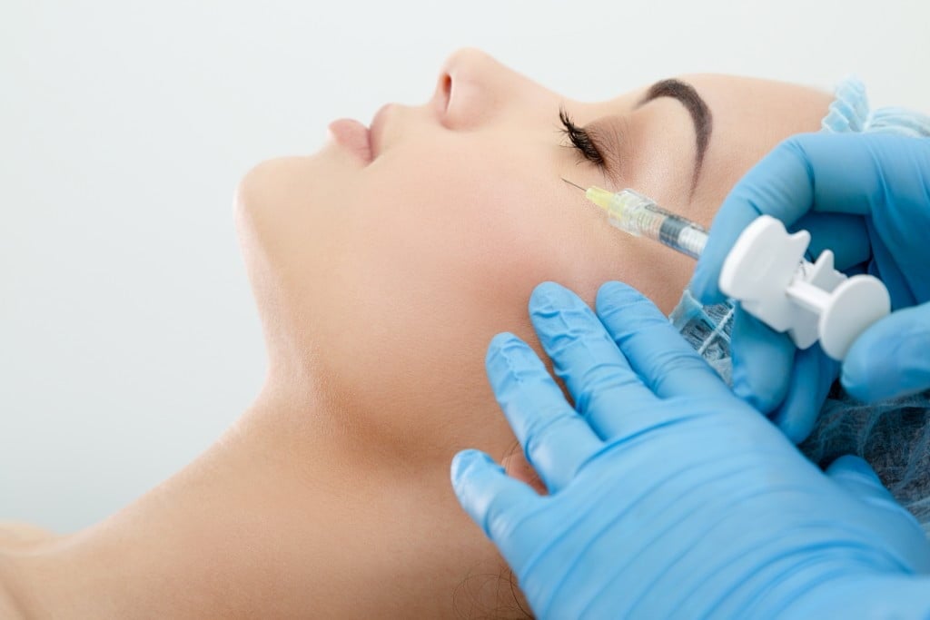 Cheekbone filler syringe. Cheek Fillers Everything to Know