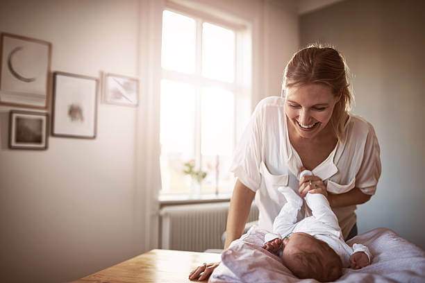 Woman playing with child