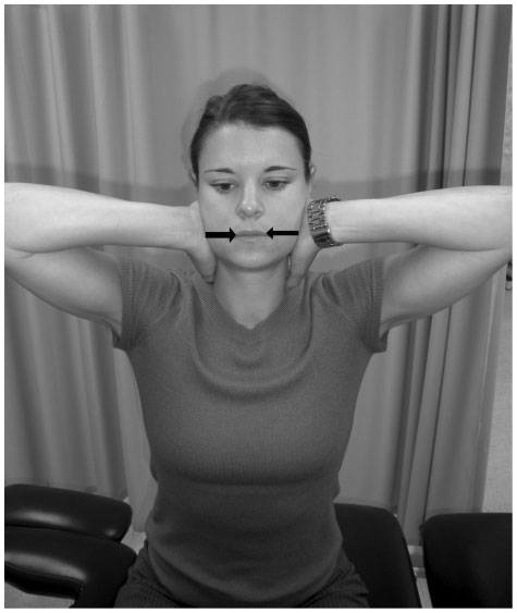 A woman doing a jaw excercise for TMJ
